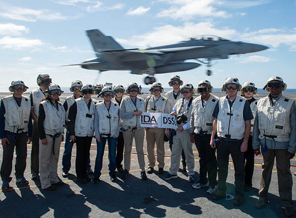 IDA staff on an aircraft carrier