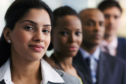 Young professionals smiling in photo